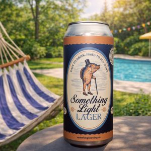 Something Light Lager can on a garden table beside a backyard pool and hammock