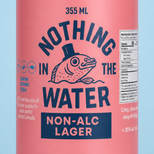 Nothing in the Water Non-Alc Lager 355 mL can with fish illustration on a pink label